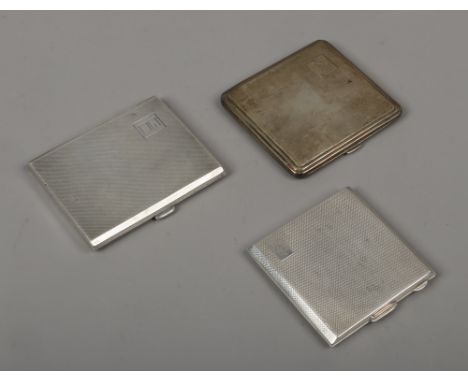 Three silver cigarette cases with engine turned engraving, assayed Birmingham 1936, 8 and 9, 247 grams.