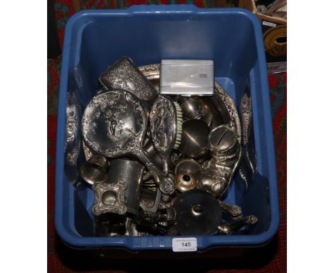 A box of silver plate to include candlestick, dressing table set, cigarette case etc.