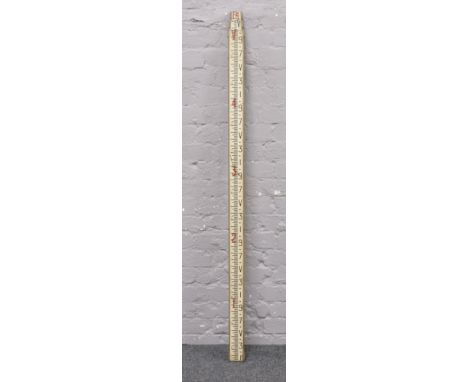 A Holbro teleform surveyors three section level made in England.