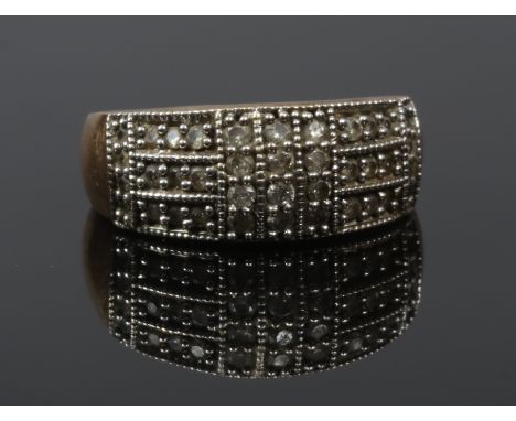 A 9ct gold ring pave set with diamonds within milgrain borders, size N, 5.4 grams.