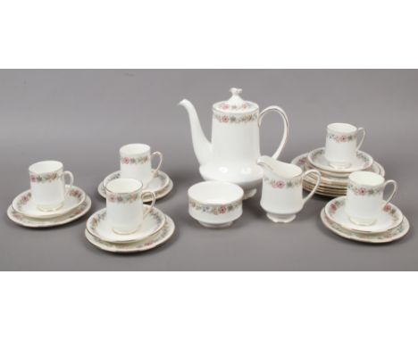 A Paragon bone china part tea set in the Belinda design including tea pot, milk jug, sugar bowl, cups and saucers etc.