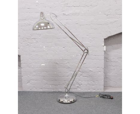 A large chrome effect angle poise standard lamp.