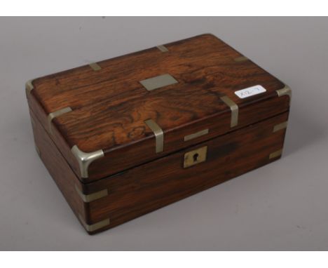 A white metal bound rosewood trinket box.