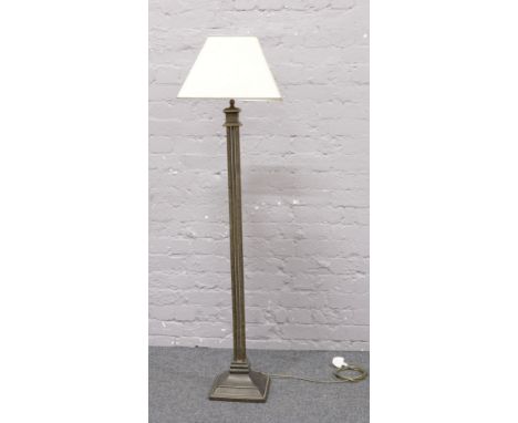 A decorative bronze effect standard lamp with five column supports.