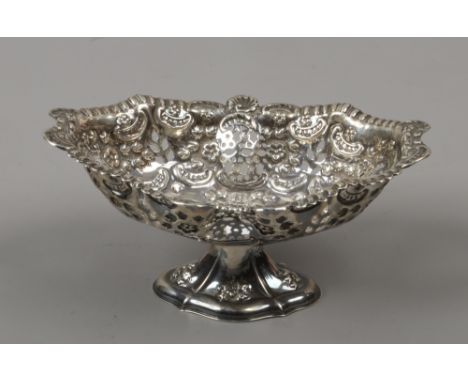 A Victorian pierced silver pedestal lozenge formed bowl by William Hutton, assayed Birmingham 1899, 185 grams.