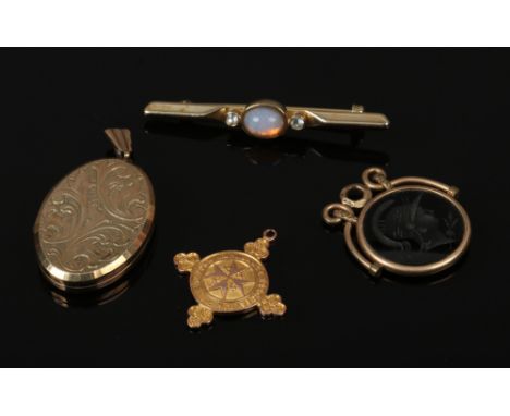 A 15ct gold St Johns Ambulance medal assayed Birmingham 1923 5.12 grams, a 9ct gold locket, yellow metal bar brooch and a pin