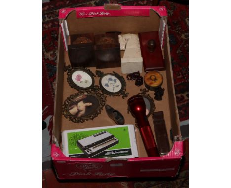 A box of collectables to include book ends, desk blotter, torch, framed portrait prints, stylophone etc.