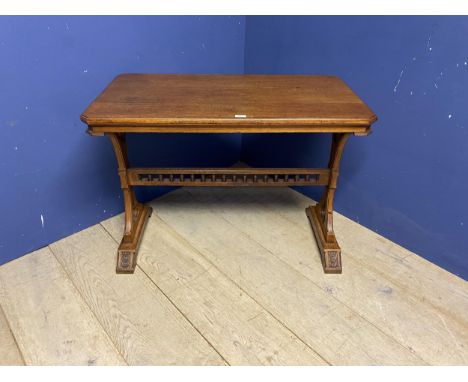 Light honey coloured oak table, with galleried central stretcher and ecclesiastical carvings to each side pedestal&nbsp;72cm 