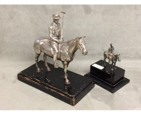 Sterling silver model of a seated polo player on a polo pony, with Sterling silver polo mallett, by Mappin and Webb, marks an