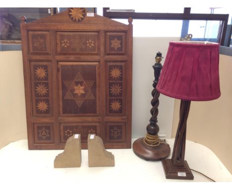 Two wooden table lamps, and a pair of stone bookends, purporting to come from The houses of Parliament, and a wooden inlaid p