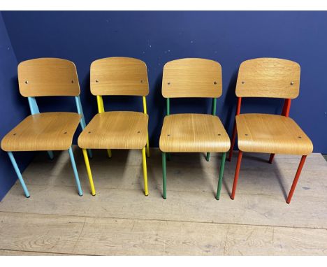 A set of 4 vintage style chairs with moulded ply seats and backs, and coloured metal legs and supports