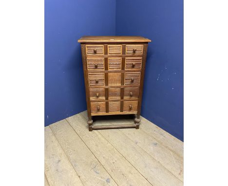 A light coloured wooden 5 drawer narrow chest 108 x 121 x 70h cm 