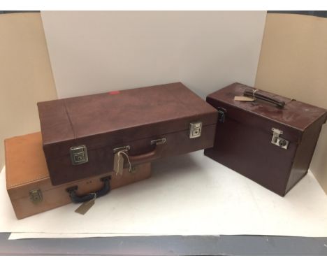 Three vintage cases, including a hat box, and one case by Olympic Corp 