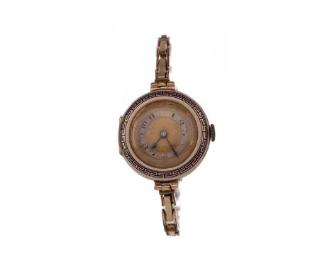 LADY'S NINE CARAT GOLD CASED MANUAL WIND WRIST WATCH,the round gold coloured dial with Arabic hour markers, dot outer seconds