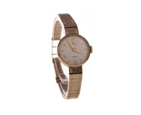 LADYS ROLEX PRECISION NINE CARAT GOLD MANUAL WIND WRIST WATCH,the round cream dial with applied Arabic and wedge hour markers