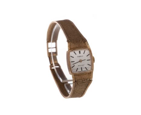 LADY'S TISSOT NINE CARAT GOLD MANUAL WIND WRIST WATCH,the square silver coloured dial with applied baton hour markers, 17mm c