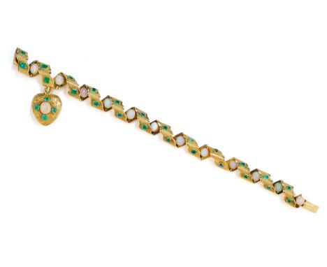 GOLD, EMERALD AND OPAL BRACELET, 1860s designed as a textured tapoering ribbon embelished with square emeralds and oval caboc