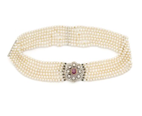 RUBY, DIAMOND AND CULTURED PEARL CHOKER the seven rows of cultured pearls on an oval openwork scalloped clasp millegrain set 