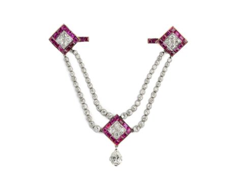 CARTIER (HENRI PICQ): RUBY AND DIAMOND SURETE PIN, 1910s gold and platinum mounts designed as two square finials each set wit