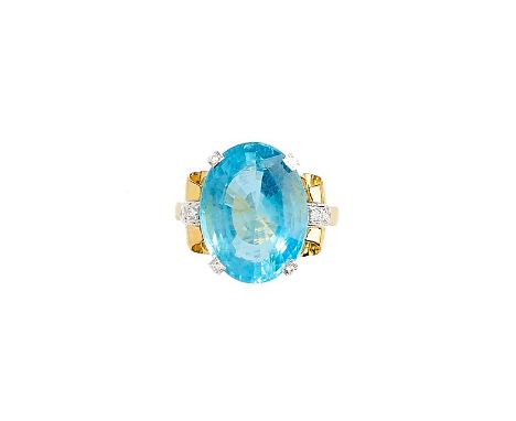 GARRARDS: AQUAMARINE, DIAMOND AND GOLD RING, 1994 centring on an oval aquamarine, to four claws each accented with a brillian