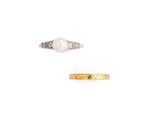 PEARL AND DIAMOND RING AND WEDDING BAND, 1930s centring on a single pearl measuring approximately 7.3mm, set between shoulder