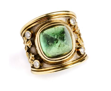 ELIZABETH GAGE: GOLD, PERIDOT AND DIAMOND 'TEMPLAR' RING, 1999 centring on a sugar loaf peridot to a wide tapering gold band 