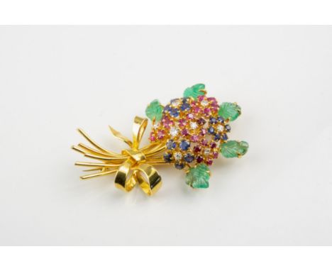 An 18ct yellow gold, ruby, sapphire, diamond and carved fluorite flower brooch, modelled as a floral bouquet with tied ribbon