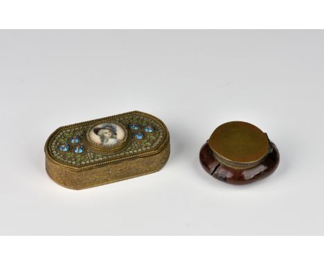 An antique Continental gilt metal trinket box, c.1900, of rectangular rounded form, the hinged lid with enamel foliate decora
