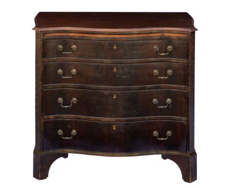 A mid-19th century mahogany serpentine chest of drawers, in the George III style, the moulded top over blind fret carved cant