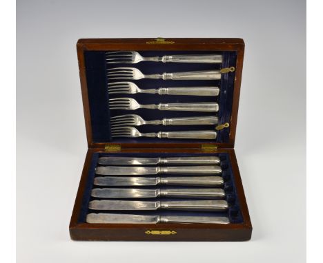 A cased set of six George V silver fish knives and forks, Harrison Brothers & Howson, Sheffield 1935, all silver, with hollow