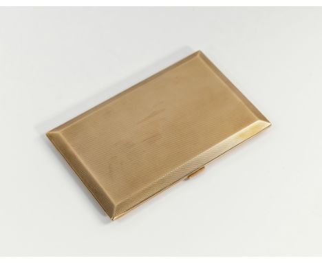 A George V engine turned 9ct gold cigarette case, Thomas William Lack, London 1935, of rectangular form with chamfered edges,