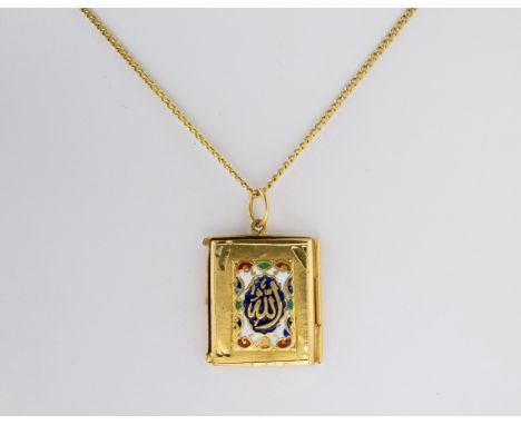 A Middle Eastern gold and enamel locket in the form of a book, tests as 22ct gold, the side-hinged locket with enamelled deco
