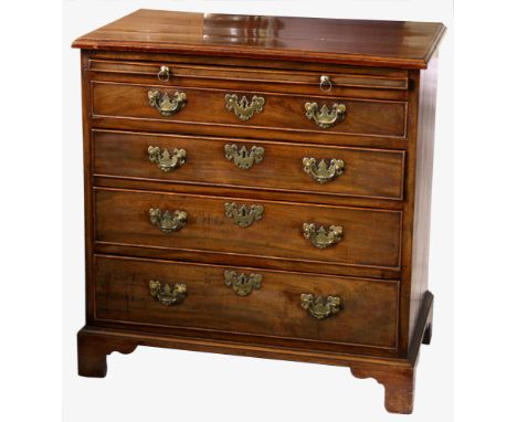 A good George III mahogany bachelor's chest, the moulded top over a brushing slide and four graduated drawers with the origin