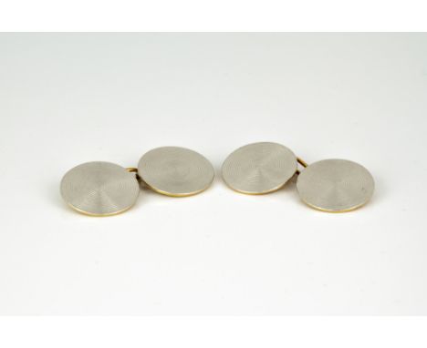 A pair of 18ct two colour gold cufflinks in the form of LPs or vinyl records, the circular links in yellow gold, faced with c