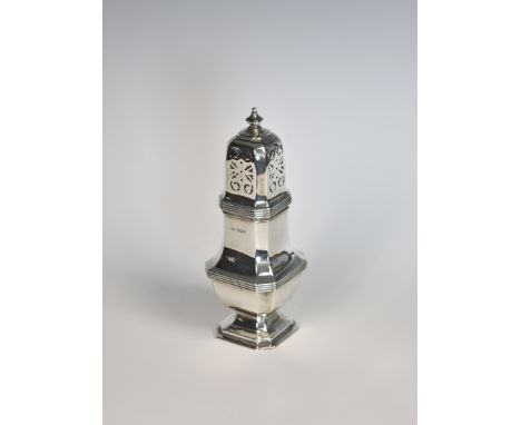 A George V silver sugar caster, Mappin & Webb, Sheffield 1932, of squared baluster form with reeded borders, 8¼in. (21cm.) hi