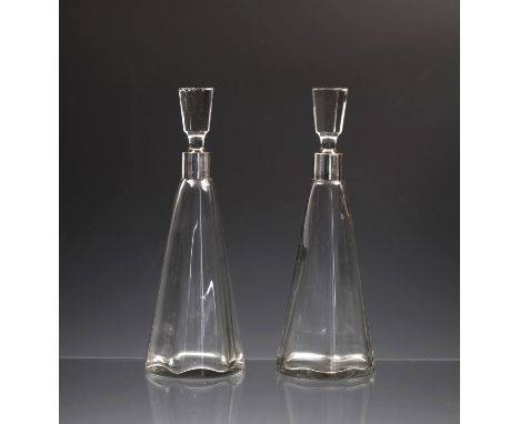 A pair of George V silver mounted Art Deco tapered decanters, hallmarked James Deakin & Sons, Sheffield 1924, of tapered hexa