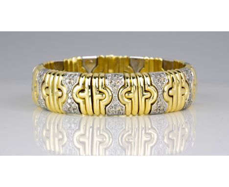 A Bulgari Parentesi two colour gold and diamond bracelet, signed 'BULGARI' and '750', the white gold hour glass shaped links 