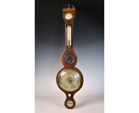 A George IV mahogany wheel barometer by A. Carioli of Sheffield, the boxwood and ebony strung case with ebonised broken arch 