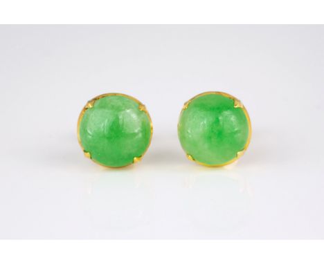 A pair of 18ct yellow gold and jade stud earrings, the 9mm. circular cabochon jade stones in four claw settings. (2)