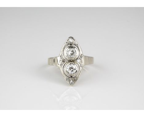 An Art Deco style 14ct yellow gold and diamond ring, 1930s-40s, the pierced, marquis shaped ring set with two old brilliant c