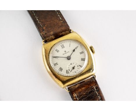 A Rolex cushion cased 9ct gold gentleman's manual wrist watch, 1930s, the circular 21mm. silvered dial signed 'Rolex', with b