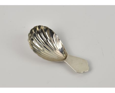 A George III silver scallop shell caddy spoon, maker's mark CH, London 1791, with trefid style handle, 3in. (7.6cm.) long, we