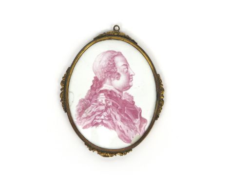 A Battersea enamel portrait plaque c.1753-56, the oval form printed in puce with a profile portrait of Prince William Augustu