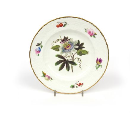 An English porcelain botanical plate  c.1815, probably London-decorated Coalport, finely painted with a passion flower to the