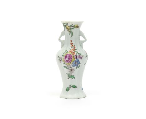 An early Worcester quatrefoil vase  c.1753-55, the lobed baluster shape painted with a floral arrangement to one side amidst 