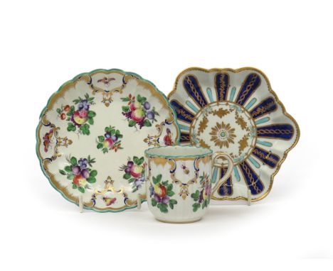 A Worcester coffee cup and saucer  c.1760-70, the fluted forms painted with small sprays of spotted fruit, the rim with panel