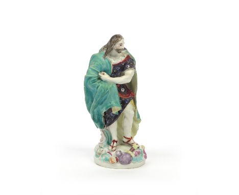 A Derby figure of St Thomas  c.1756-58, probably modelled by Agostino Carlini, drawing a green cloak around his shoulders, ra