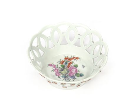 A small Worcester circular basket  c.1760, painted to the interior well with a polychrome spray of flowers including pink and
