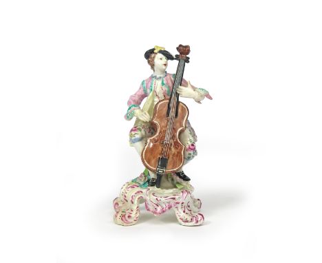 A rare Bow figure of a musician  c.1760, possibly after the Meissen figure from the Gallant Orchestra, seated and playing the