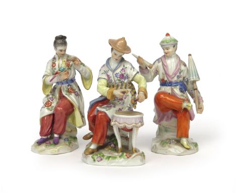 Three Meissen chinoiserie figures  20th century, one of a lady feeding a bird perched on her right hand, one of a gentleman p